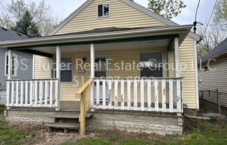 Lovely three bedroom, one bath home with brand new beautiful hardwood floors - a must see!