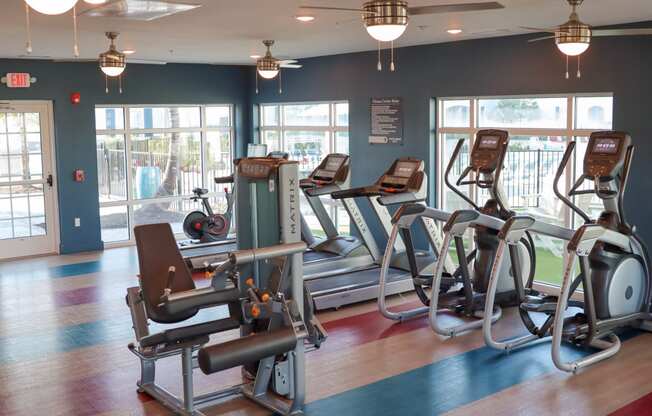 24 hour fitness center overlooking luxury swimming pool located in Naples,FL