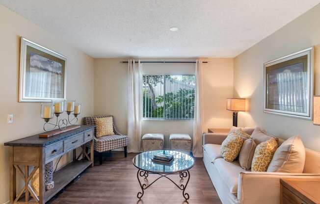 Living Room With Expansive Window at Sarasota South, Bradenton, Florida