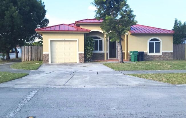 Single-story, 3/2.5 corner lot located near multiple FL Turnpike exits