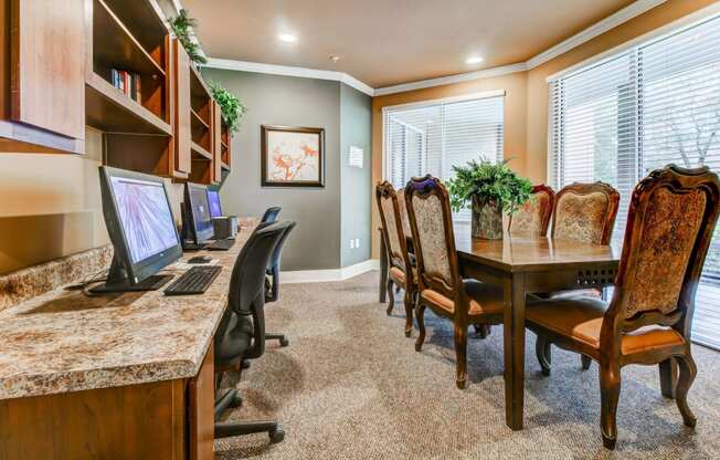 Business Center with conference table and computers