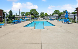 the pool is clean and ready for guests to use at the crossings at northwest apartments