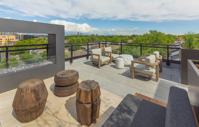 Elevate your outdoor experience in our community's rooftop seating area