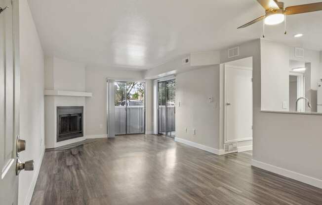 Living Room with Fireplace at Horizon East Apartments