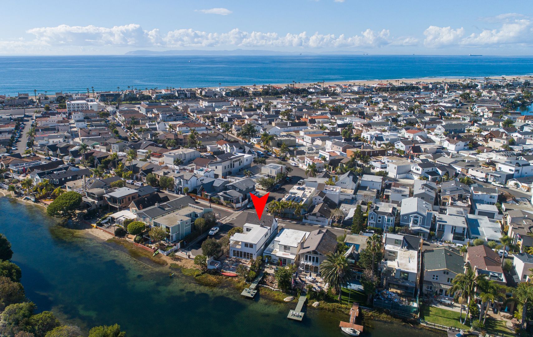 NEWLY REMODELED SINGLE-FAMILY HOME ON THE CANAL FRONT IN NEWPORT SHORES