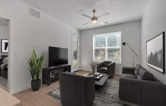 Living Room with Couch and Chairs at Garden Lofts