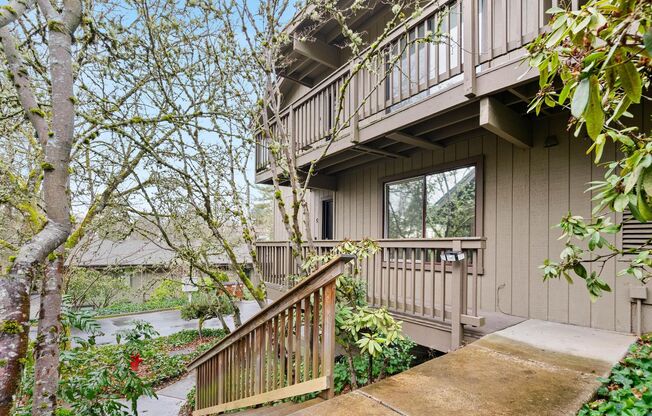 Spacious 1-bdrm/1-bath condo in quiet neighborhood. Balcony, 2 parking spaces, fireplace, hot tub, & pool