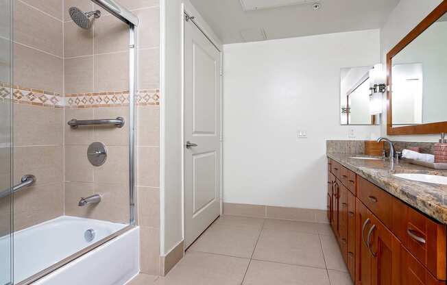 a bathroom with a bathtub and a sink