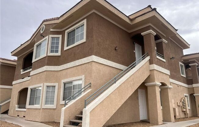 Bright 2-Bed Condo with Dual Balconies, Garage & Community Amenities!
