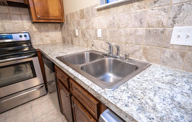 Small gated community of 39 units, conveniently located minutes from the Galleria and all that it offers. Second floor unit, overlooking the community pool, end unit with no neighbor to one side and no neighbor beneath. Washer/Dryer installed, stainless a