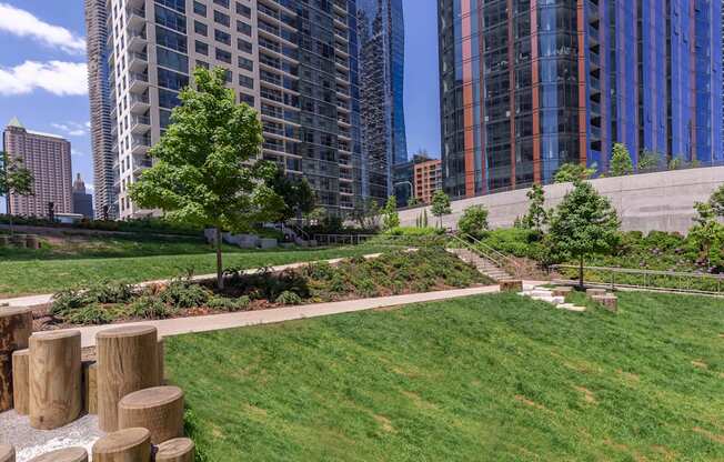 a park in the middle of a city with tall buildings at North Harbor Tower, Illinois