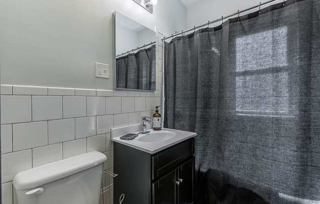 The Edison apartments bathroom with tile surrounds