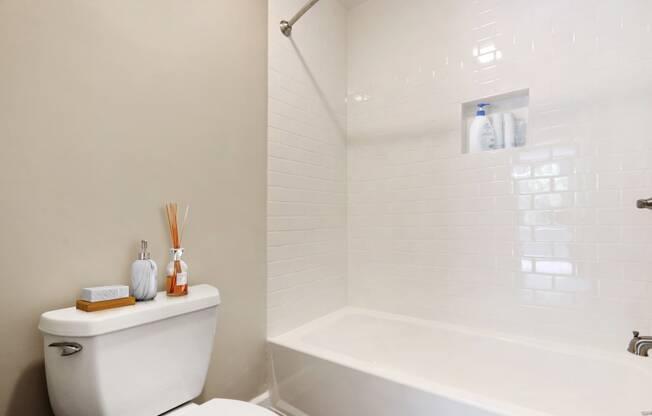 Bathroom with shower and hot tub combo