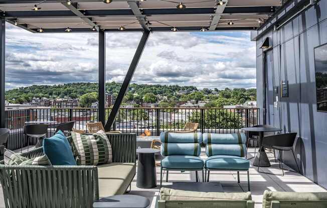 A patio with a view of the cityscape.