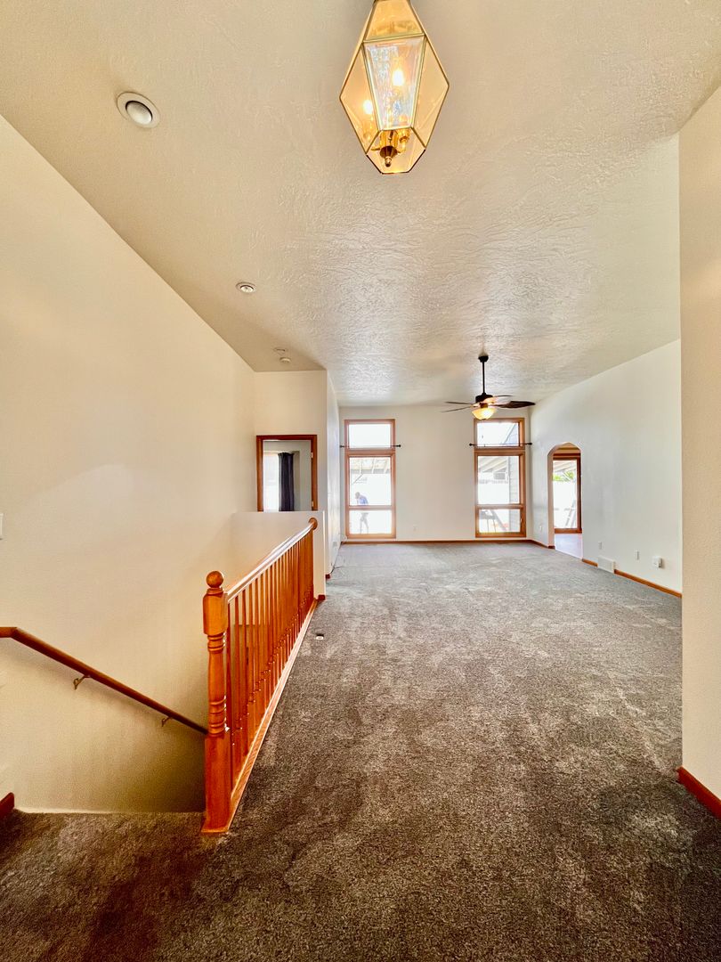 Spacious 3 bedroom/3 bath Townhome with 2 car Attached Garage and Private Yard in Evans, CO