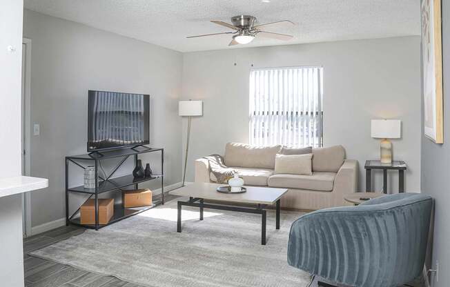 a living room with a couch and a coffee table