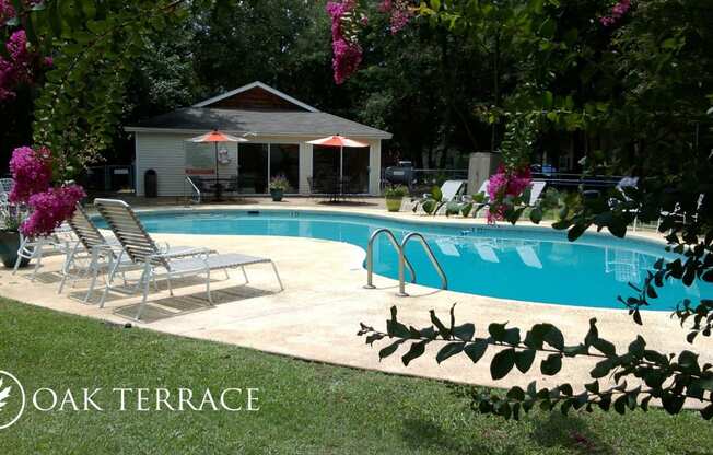 a swimming pool in the backyard of a house