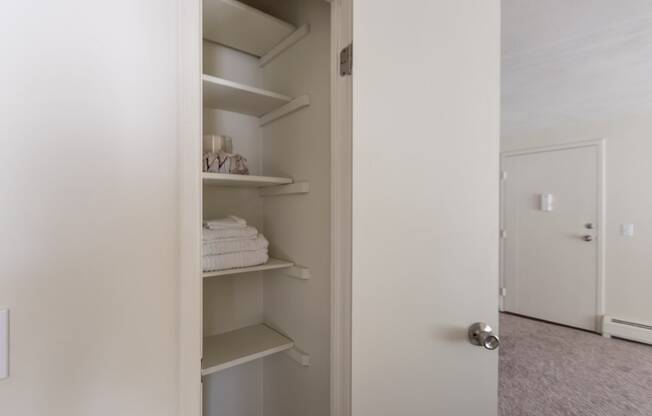 This is a photo of the hallway linen closet in a 560 square foot, 1 bedroom, 1 bath apartment at Aspen Village Apartments in Cincinnati, OH.