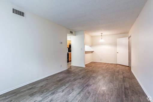 Empty living room at Pineview Apartments, in Clearwater, FL 33755