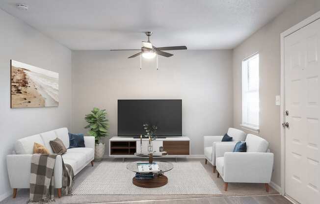 a living room with white couches and chairs and a large tv on the wall