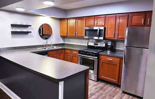 Clubhouse kitchen at Woodbridge Apartments Bloomington.