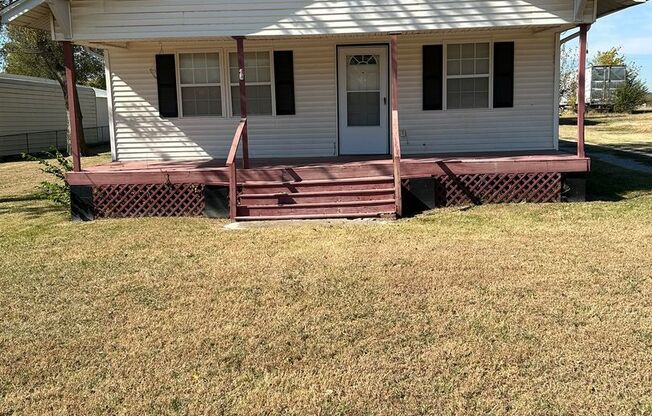 Nice 2 or 3 bedroom with covered front porch.