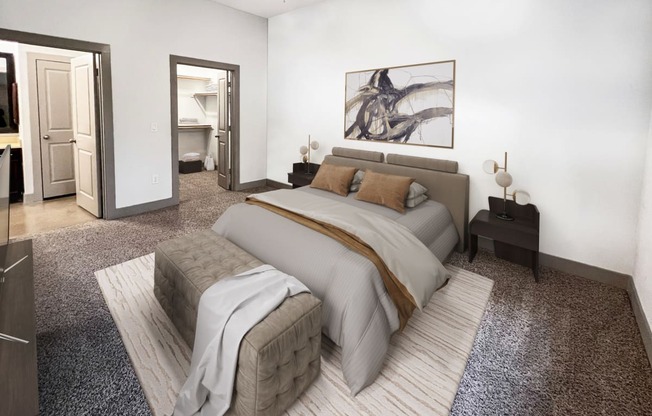 a bedroom with white walls and gray carpet