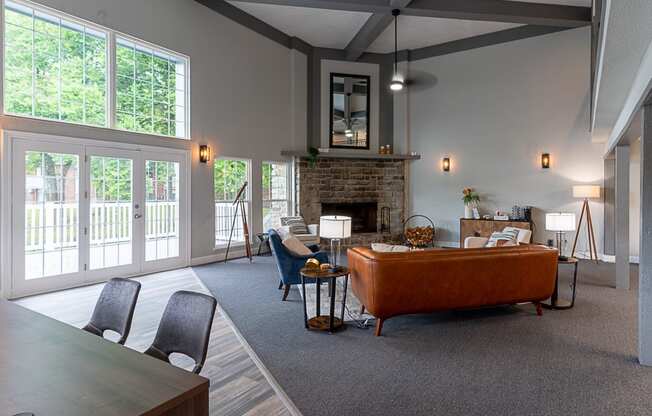 Lounge With Fireplace at Camelot East Apartments, Fairfield, OH