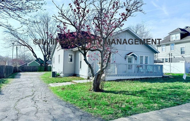 203 SE 1 ST