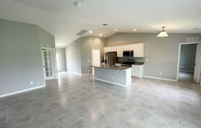 FREE APPLICATION SPECIAL- 3 Bedroom + Den - 2 Bathroom- NE Cape Coral