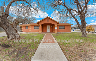 3323 W WOODLAWN AVE