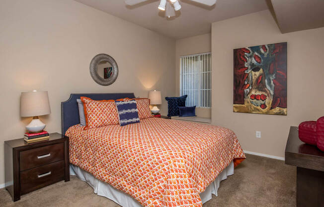 Bedroom with cozy bed and ceiling fan and lights at The Belmont by Picerne, Nevada
