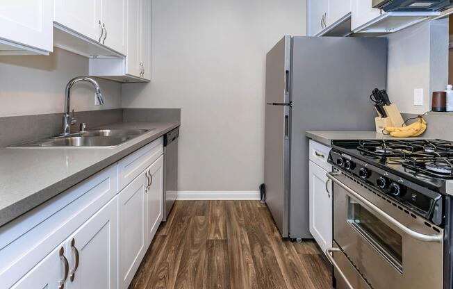 a kitchen with a stove top oven