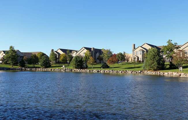 Villa buildings along a large pond