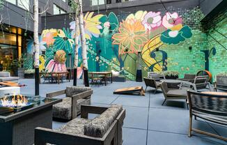A vibrant courtyard gathering spot at Echo Street West, near Modera Westside Trail—perfect for relaxed hangouts surrounded by Atlanta’s creative energy.