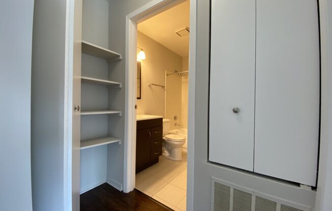 Conveniently located bathroom with linen closet