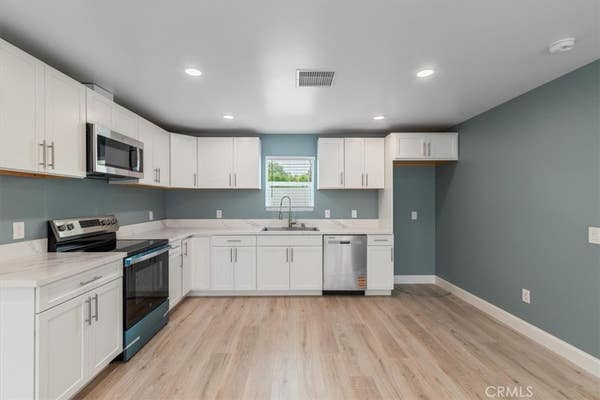 13027 HERRICK AVE