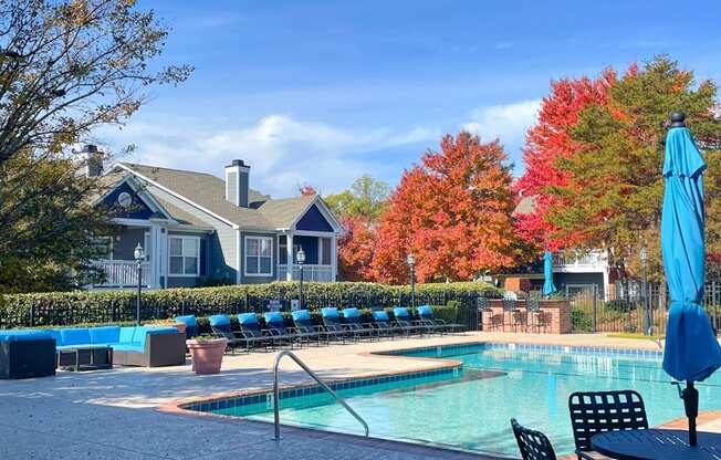 pool and fall leaves on trees at Reserve at Bridford, North Carolina, 27407