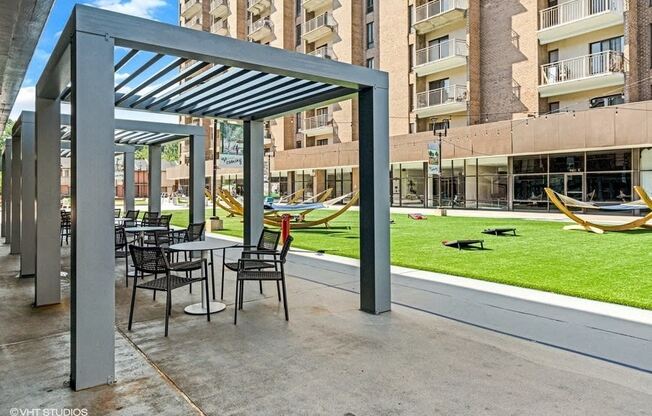 Bistro seating to enjoy the Virginia breezes in The Plaza at Trillium Apartments, Fairfax, Virginia