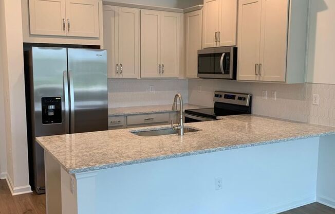 Brand New 4/2.5 Gorgeous Townhome with a 2 Car Garage in Meridian Park - Orlando!