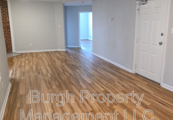 114 W 8 AVE