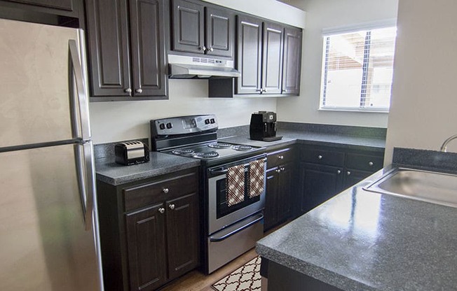 Beautifully designed kitchen inside your apartment home at The Reserves of Melbourne in Melbourne, FL