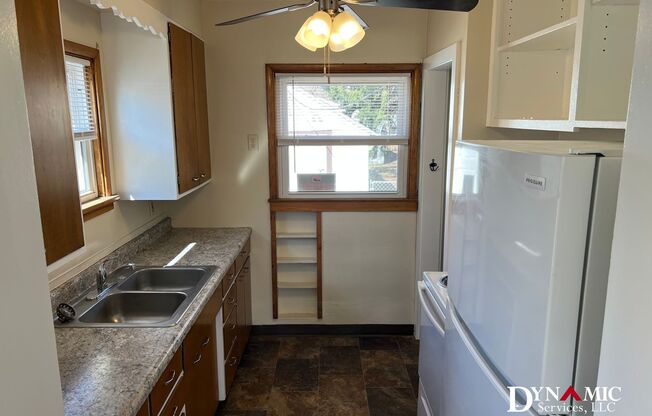 Updated 4+ Bedroom, 2 Bathroom House with Garage and Fenced Backyard