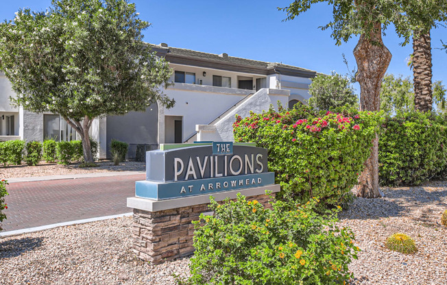 an image of the pavilion at arrowhead apartments sign