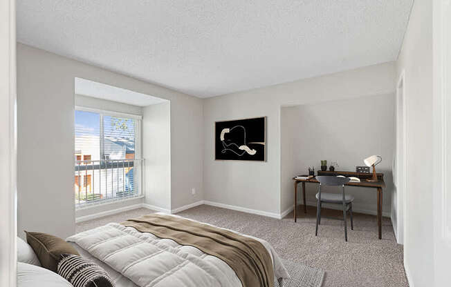 Model Bedroom with Carpet and Window View at Horizon Apartments located in Santa Ana, CA.
