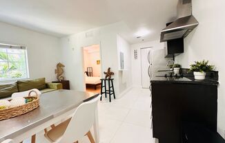 Bright and furnished 1/1 in classy remodeled Art Deco Building
