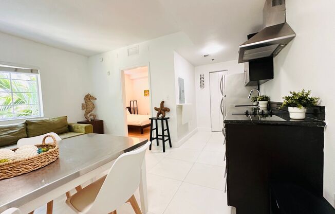 Bright and furnished 1/1 in classy remodeled Art Deco Building