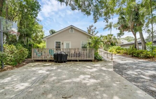 Quaint 2/1 home with plenty of yard, deck and privacy.