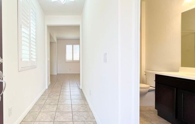 Well-maintained 4-bedroom, 3-bath home in a desirable gated community