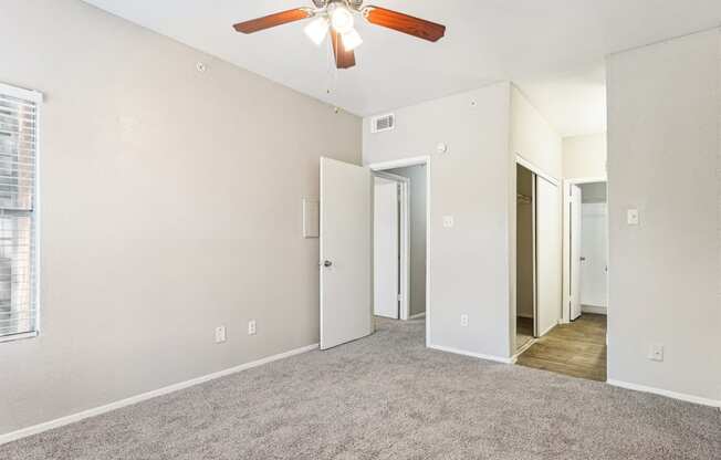 Comfortable bedroom with closet space at Laurels of Sendera apartments in Arlington, TX